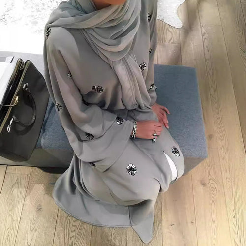 Abaya med strassblommor