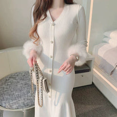 Midi dress with buttons and fur sleeves